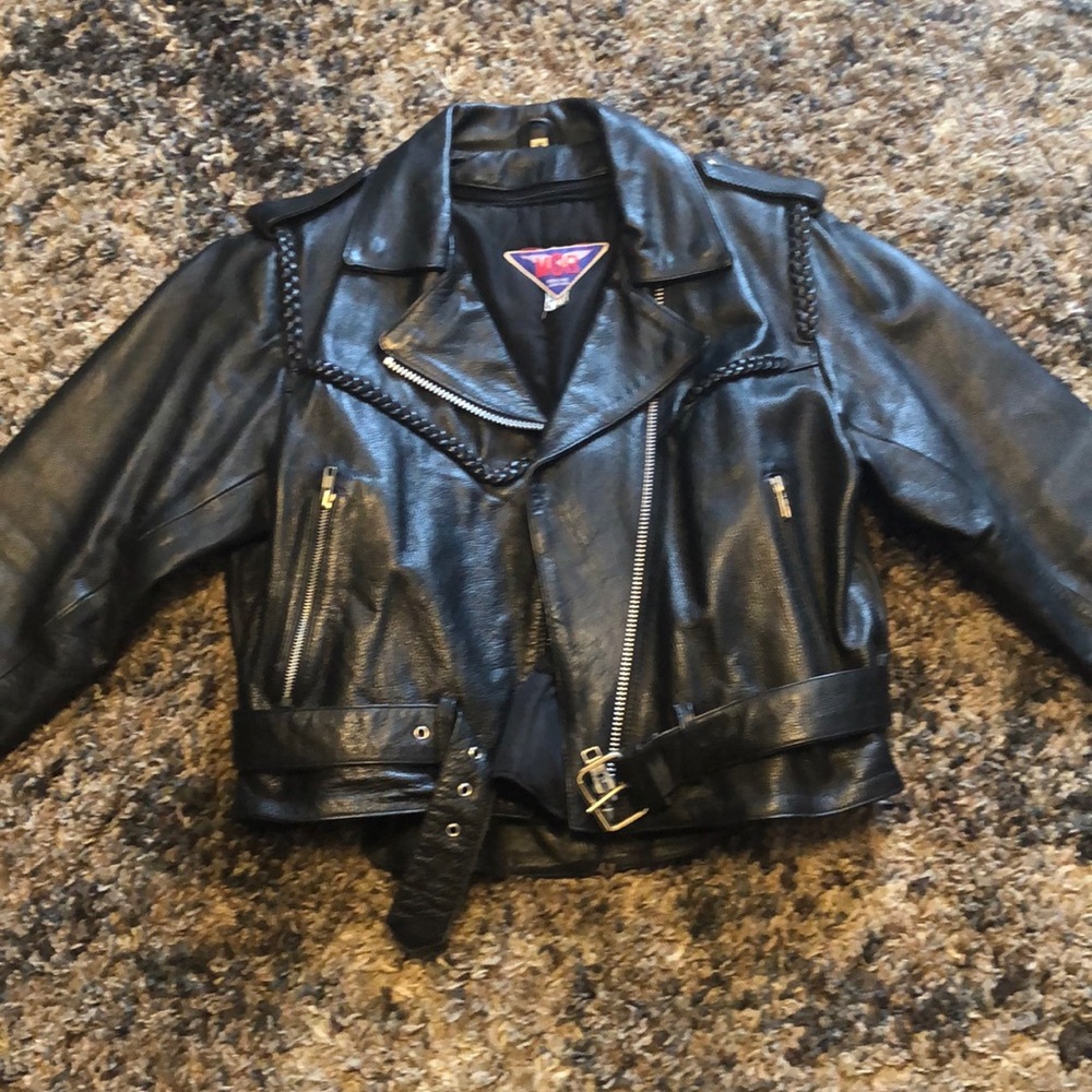 Leather motorcycle jacket with zip out liner. Women size 14 great condition